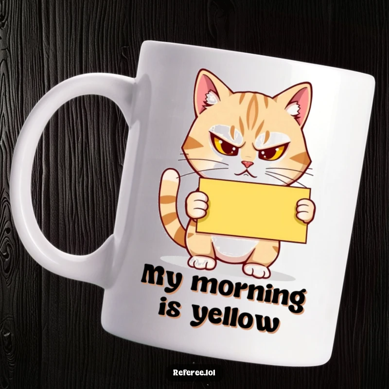 Funny Mug: A determined cat squints, holding a yellow card firmly, embodying strict but humorous officiating for game night.