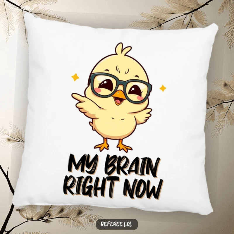 Funny giggling chick, sporting oversized glasses and pointing madly, featured on a plush pillow for humorous and cozy home accents.