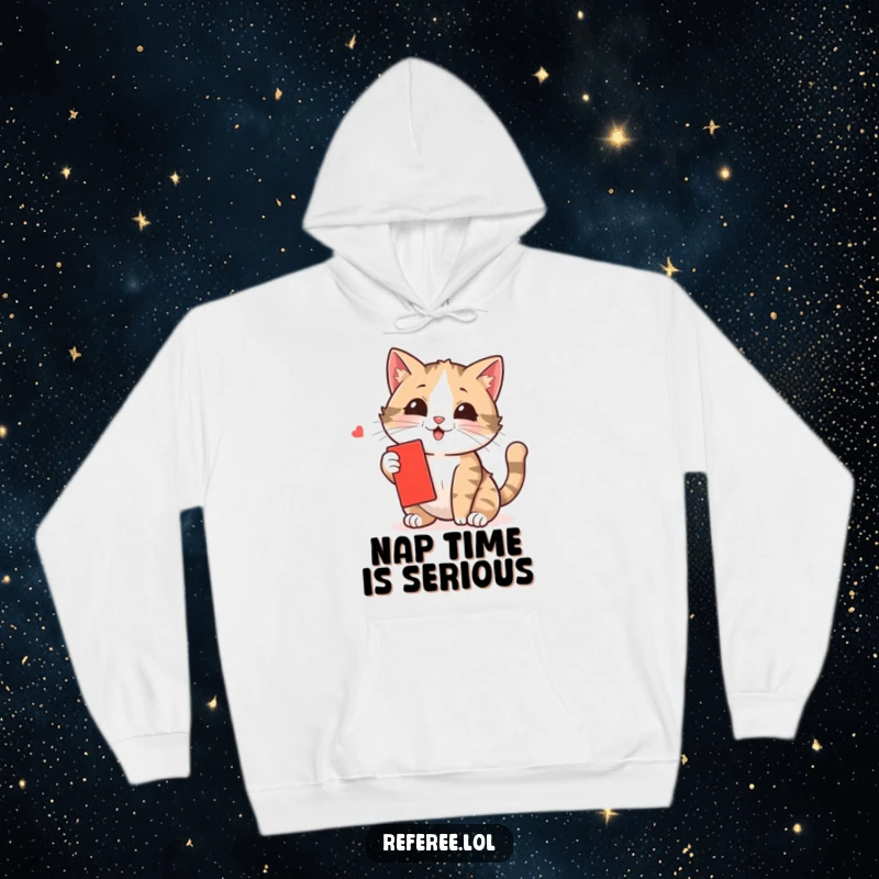 Funny cat hoodie displaying a curious kitten playfully batting at a small red card, embodying playful chaos and warmth.