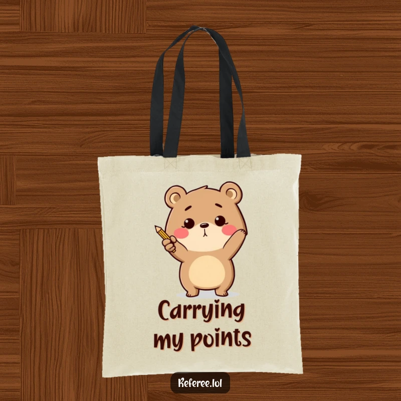 Funny determined bear energetically pointing with a tiny pencil on a tote bag, carrying goals humorously.
